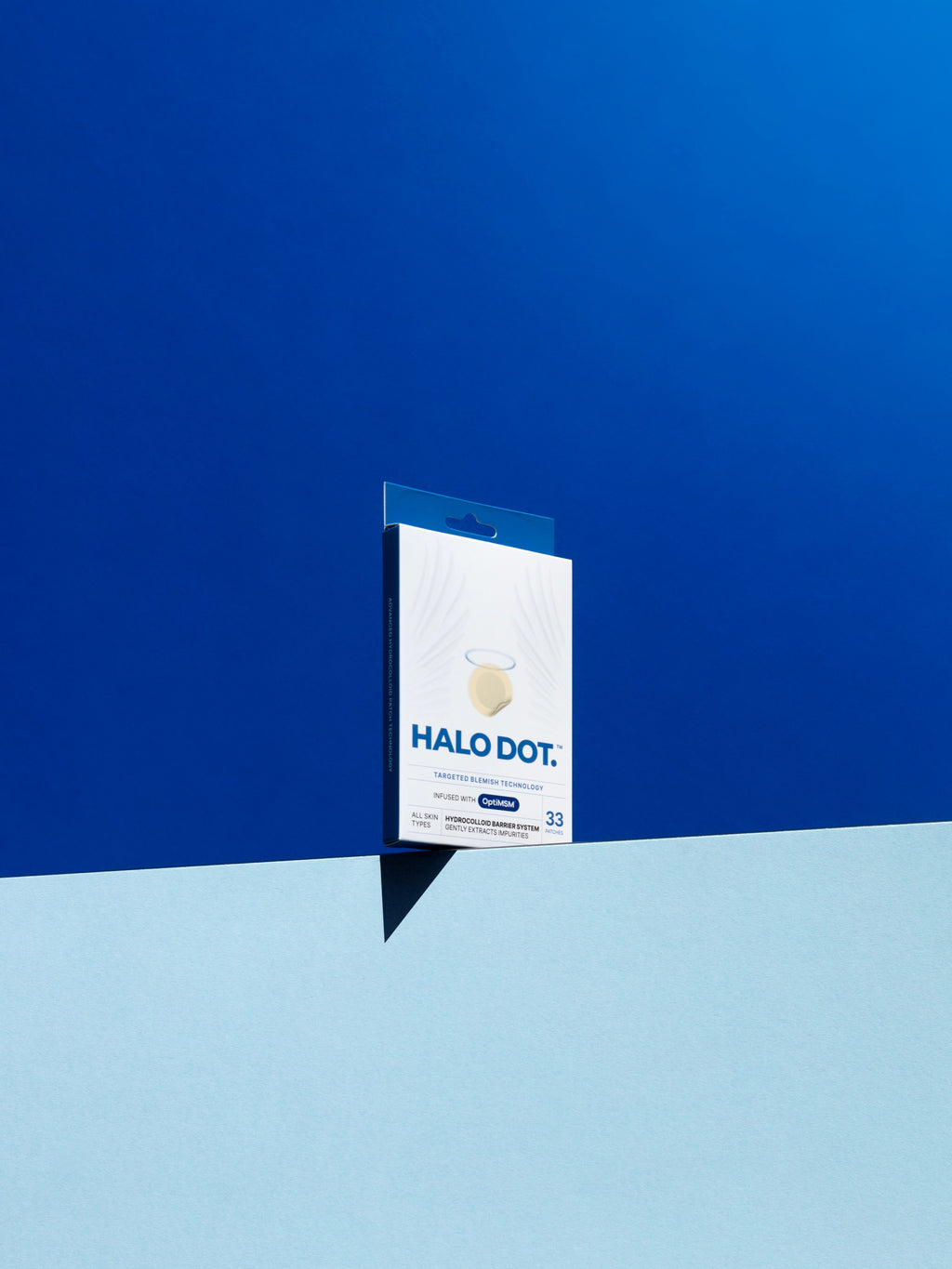 Halo Dot 33-count pimple patch package standing against a blue background